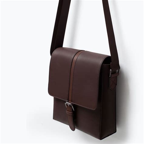 zara españa bolso hombre.